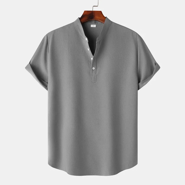 Back view of a men's natural tone henley shirt, highlighting its comfortable fit and long sleeves.