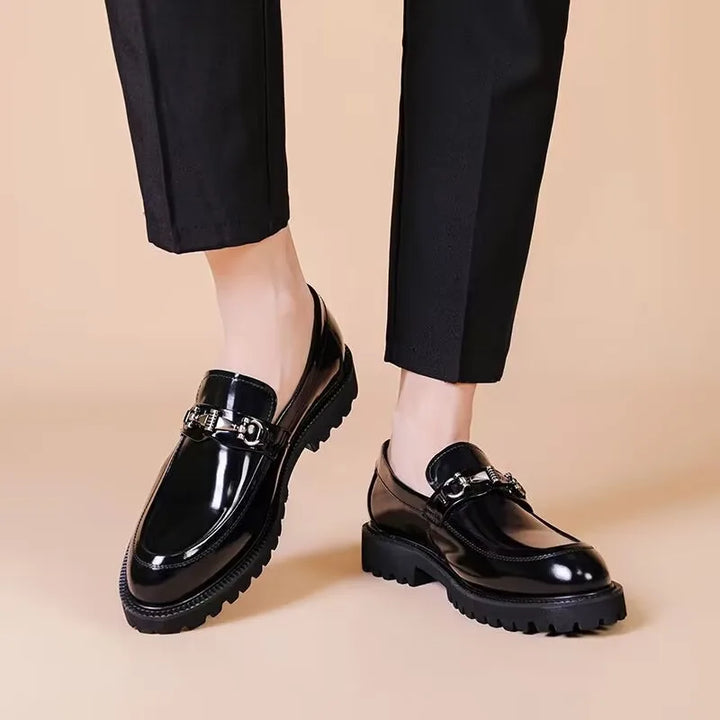 Classic men's loafers, a stylish slip-on dress shoe ideal for both formal and casual settings.