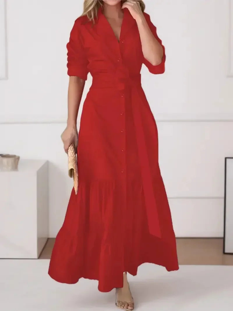 Versatile women's elegant tiered maxi shirt dress. Features long sleeves, button front, and a cinching tie waist.