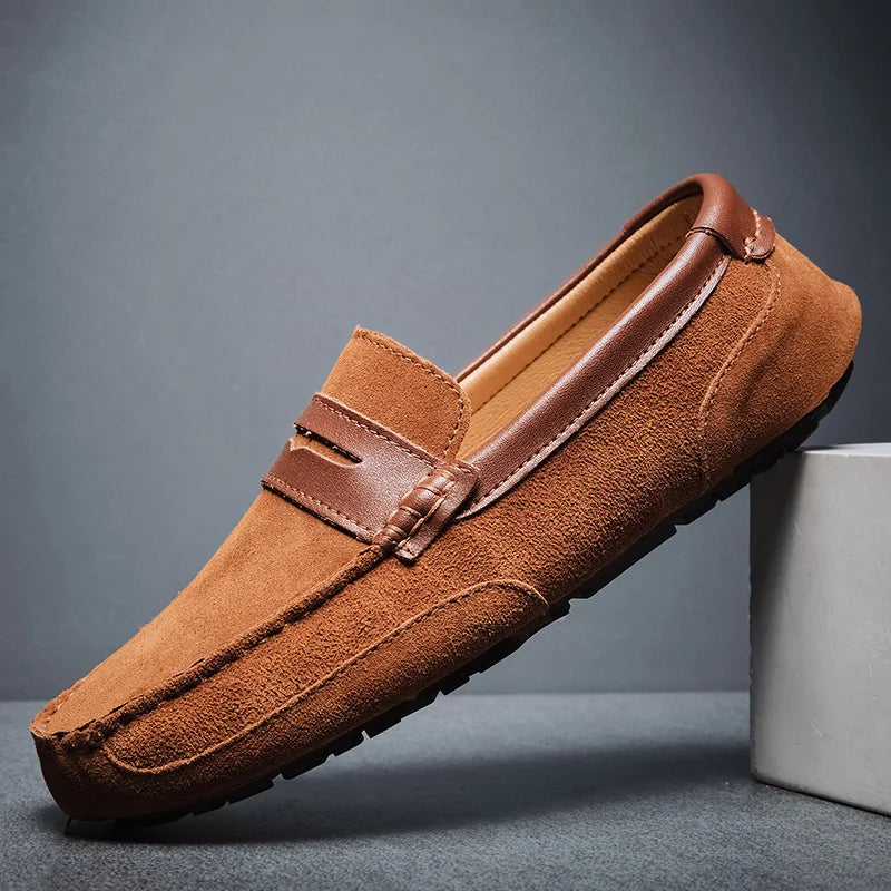 Elegant brown men's slip-on loafers for refined style. Perfect formal or casual dress shoes.