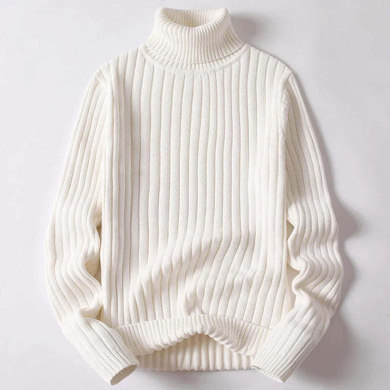 Close-up of a men's cozy knit ribbed turtleneck sweater, highlighting luxurious texture and warmth.