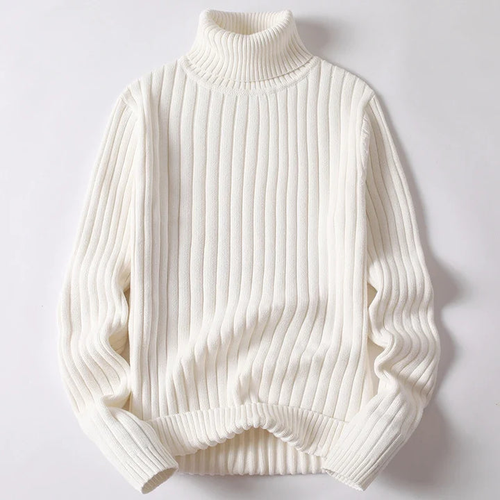 Close-up of a men's cozy knit ribbed turtleneck sweater, highlighting luxurious texture and warmth.