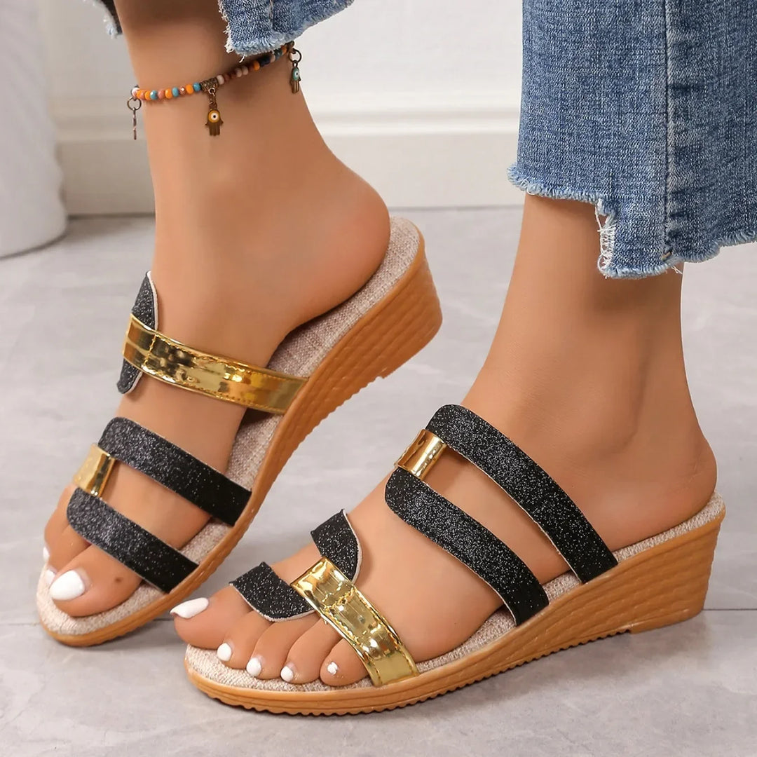 Women's glamorous shimmering strappy sandals, perfect for parties.