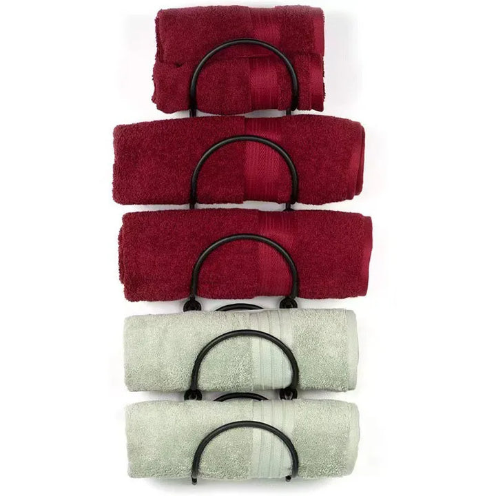 Rustproof multi-layer towel storage rack. Wrought iron bathroom organizer, ideal wall mount solution for a tidy spa.