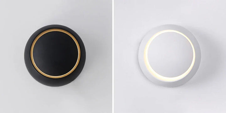Energy-efficient LED wall lamp, adjustable light for task or accent, modern design, black finish.