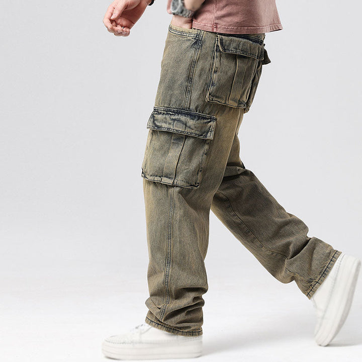 Durable blue denim men's cargo jeans, comfortable relaxed fit for utility and everyday casual wear.