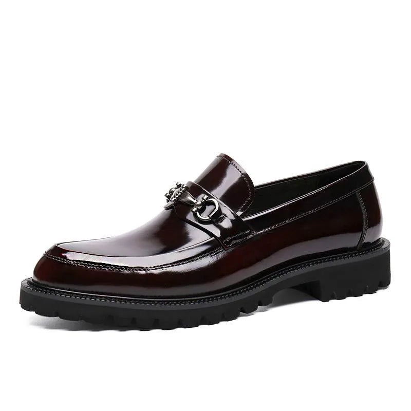 Men's elegant slip-on shoes, essential for business attire, offering a comfortable and formal look.