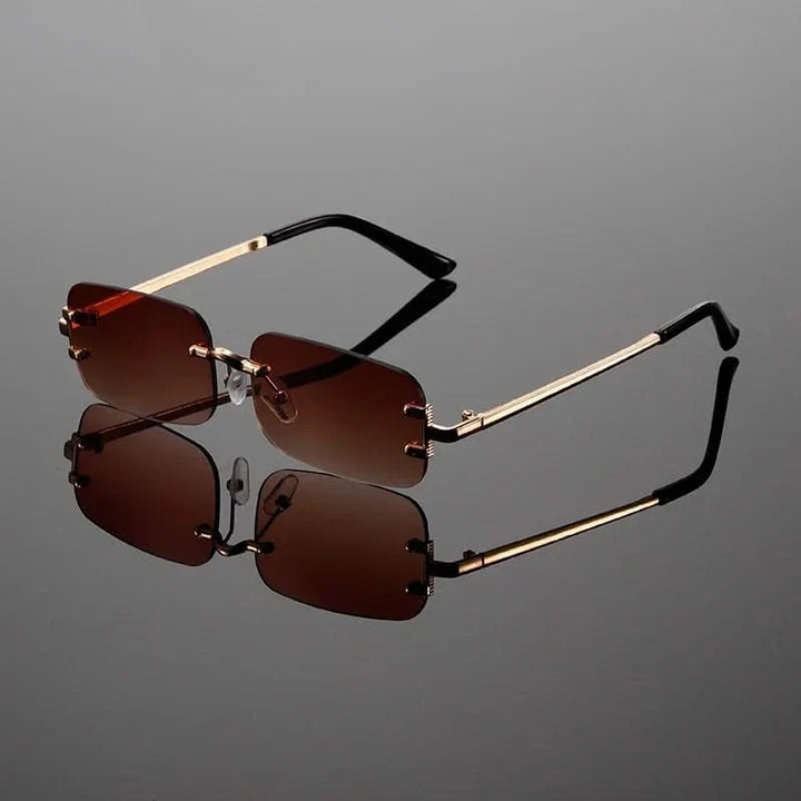 Stylish lightweight rimless sunglasses for men & women, featuring a sleek modern design and comfortable sun protection.