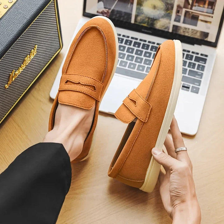 Formal men's slip-on dress shoes, offering comfort for business or events.