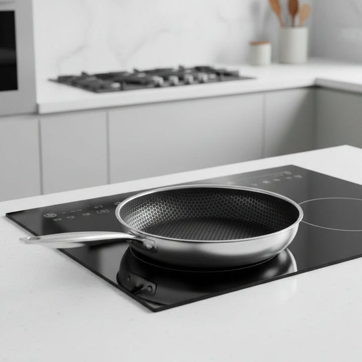 Premium stainless steel frying pan for even cooking; durable, induction compatible cookware for your kitchen.