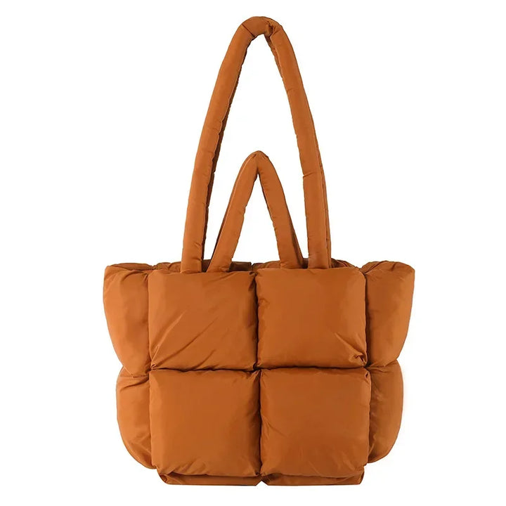Stylish women's puffer tote bag in a chic color, ideal for daily use.