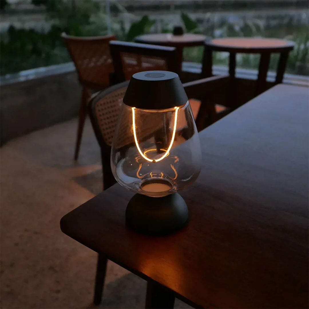 Elegant modern cordless LED table lamp, offering dimmable warm white ambient lighting for sophisticated decor.
