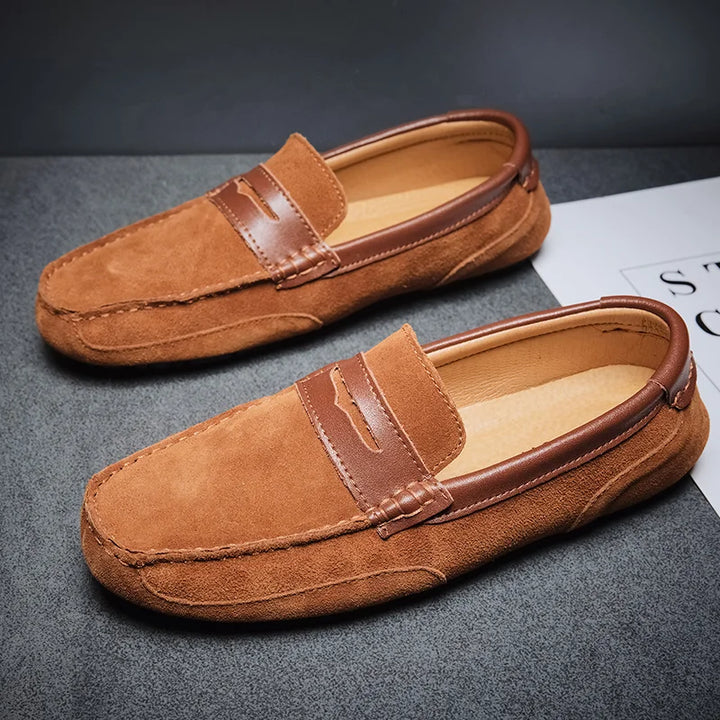 Classic black slip-on loafers for men. Comfortable and stylish dress shoes for any occasion.