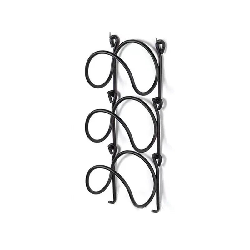 Durable rustproof wrought iron towel rack for bathroom organization. Wall-mounted multi-layer towel storage solution.