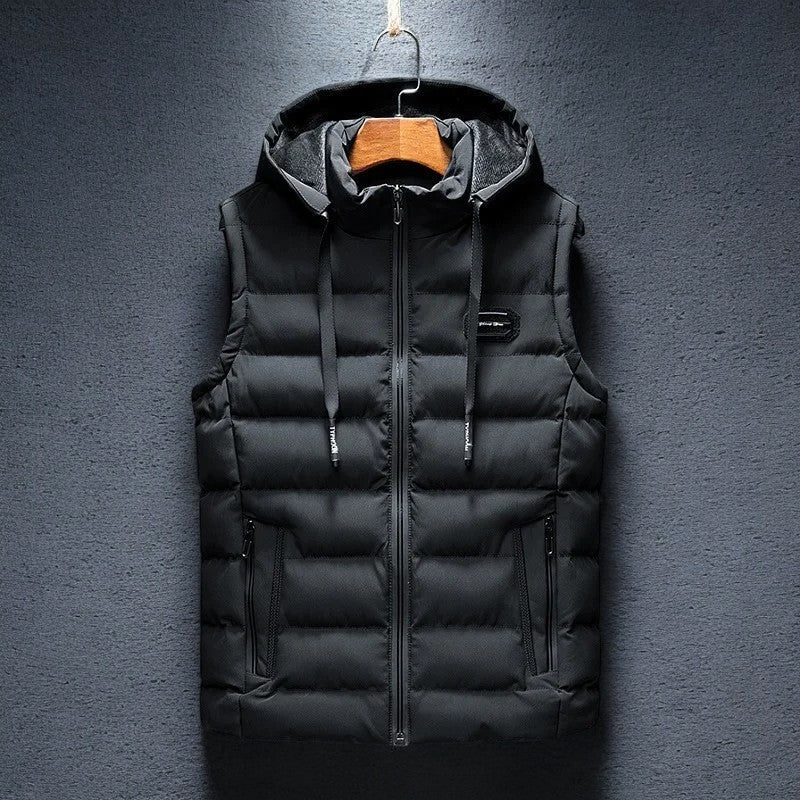 Men's Midtown Puffer Vest with hood. Lightweight, warm & insulated outerwear for cold weather.