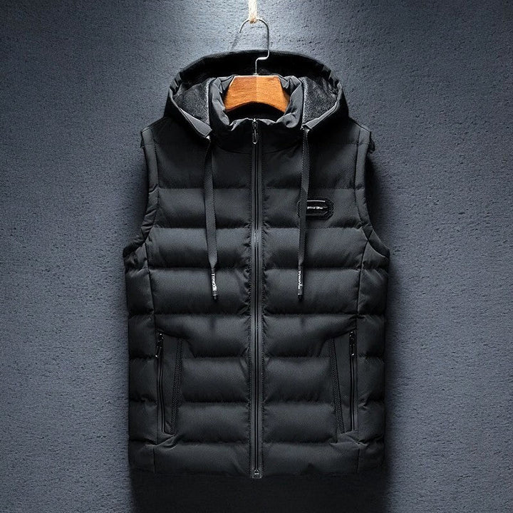 Men's Midtown Puffer Vest with hood. Lightweight, warm & insulated outerwear for cold weather.