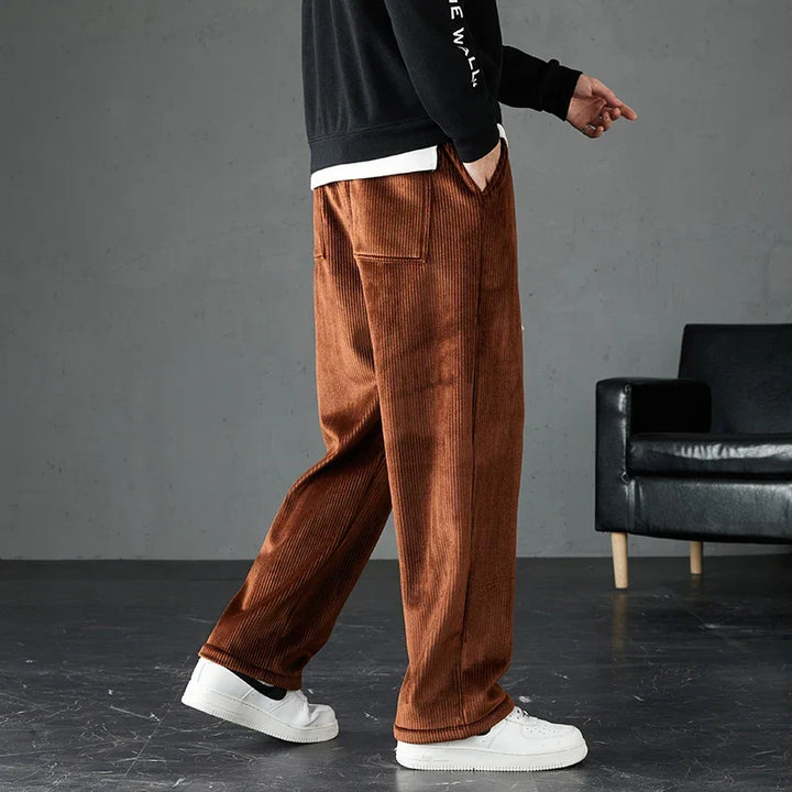 Stylish men's corduroy joggers with soft fabric and elastic waist for casual fashion & comfort.