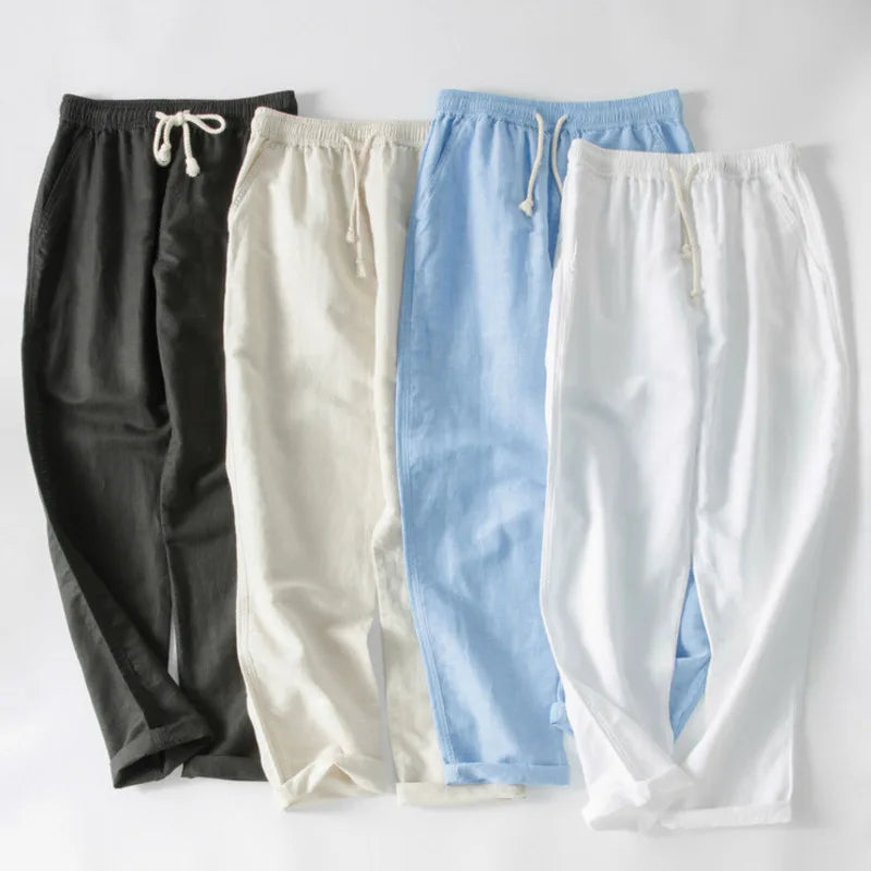 Close-up of soft, breathable linen fabric on unisex lightweight trousers, highlighting texture and quality for comfort.