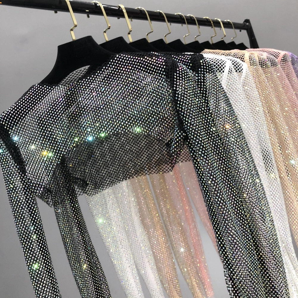 Women's glamorous shiny net top, dazzling with sparkle. Ideal for parties, clubwear, or a festive night out.