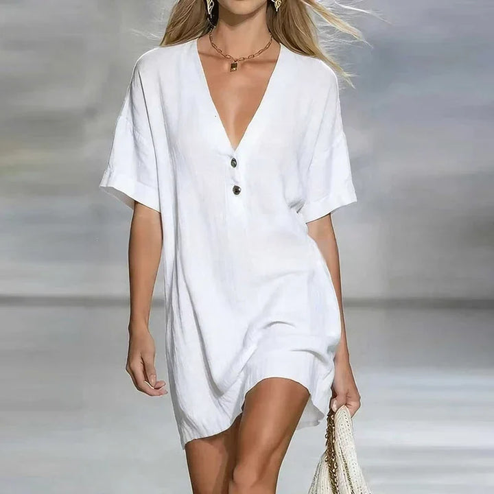 Elegant women's V-neck shirt dress. Features button details, perfect for summer casual outings.