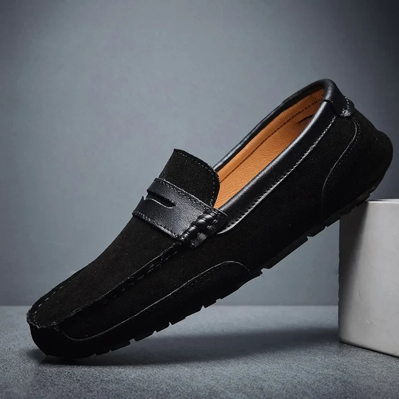 Comfortable black men's slip-on loafers. Stylish dress shoes for men, perfect for formal & casual outfits.