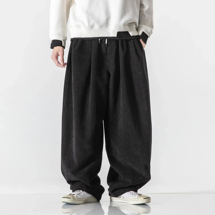 Modern streetwear relaxed fit joggers, unisex design, blending comfort with urban style.