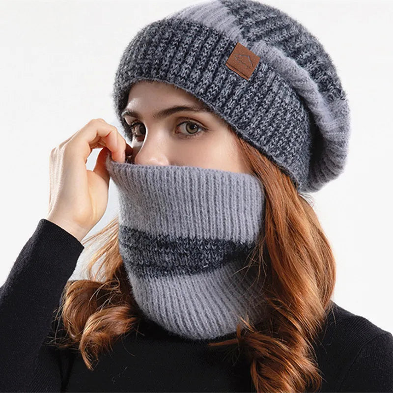 Soft knit acrylic winter beanie and matching neck gaiter, providing ultimate warmth and comfort for cold weather.