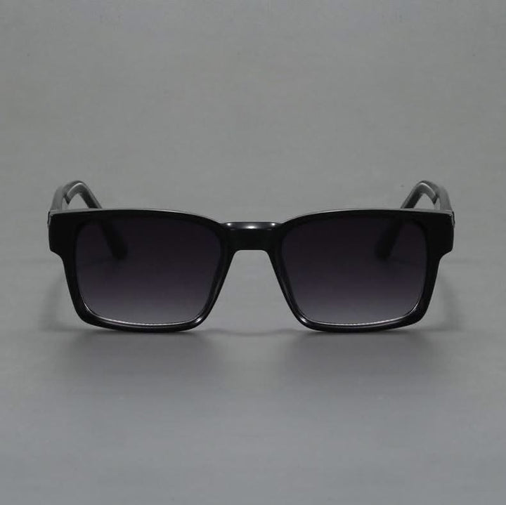 Modern bold square sunglasses, a durable fashion accessory with anti-glare UV lenses.