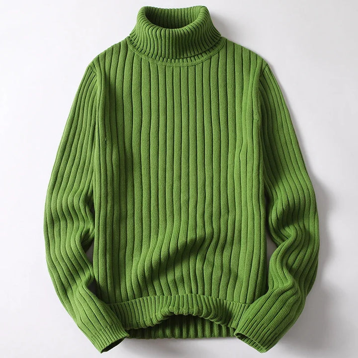 Man wearing a stylish long sleeve ribbed turtleneck pullover, perfect for refined casual winter outfits.