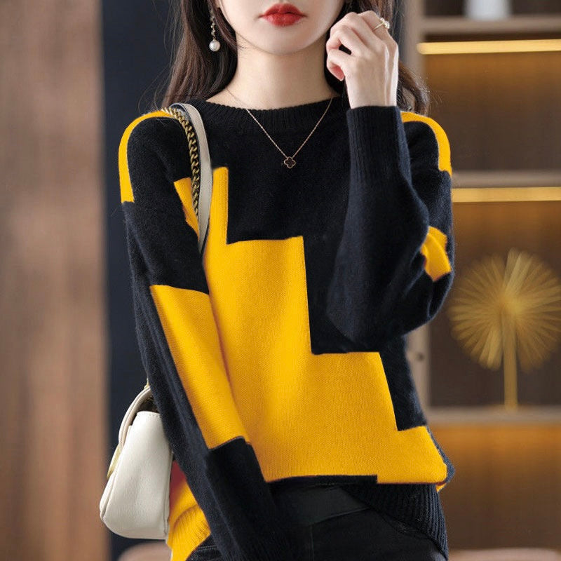 Woman modeling a vibrant Larissa long-sleeve pullover sweater, showcasing its cozy comfort and stylish look.