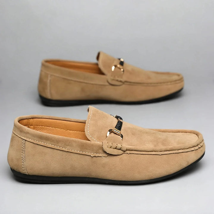 Stylish men's dress loafers with buckle, ideal for formal occasions or sophisticated office attire.