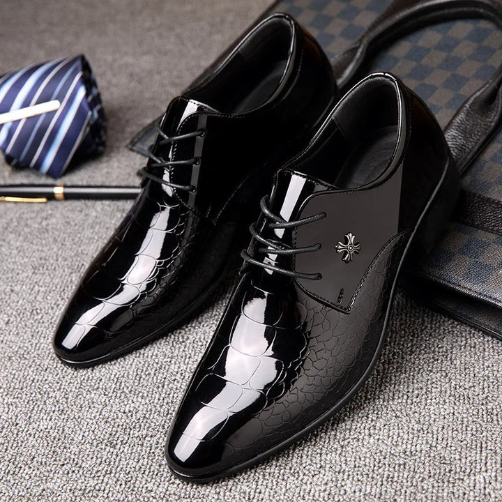 Men's classic black slip-on dress shoes, perfect for formal events, business attire, or smart casual outfits. Elegant & comfortable.