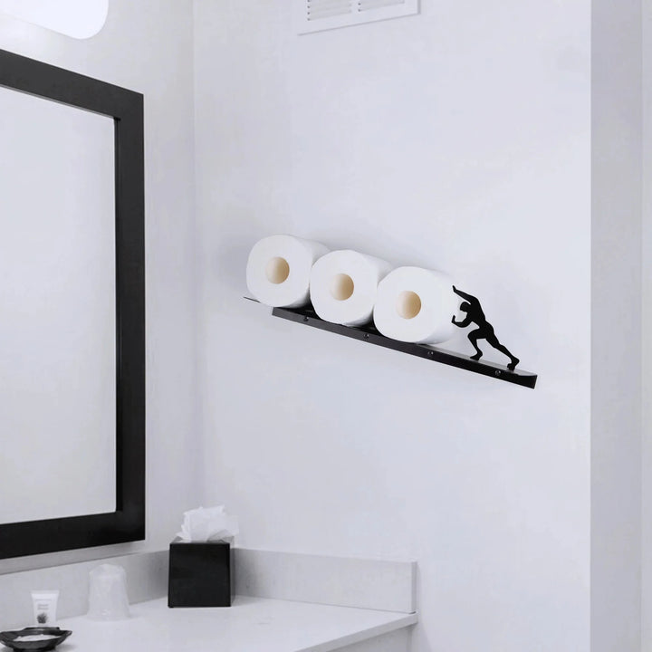 Playful freestanding iron bathroom storage shelf with integrated toilet paper holder & towel storage for modern decor.