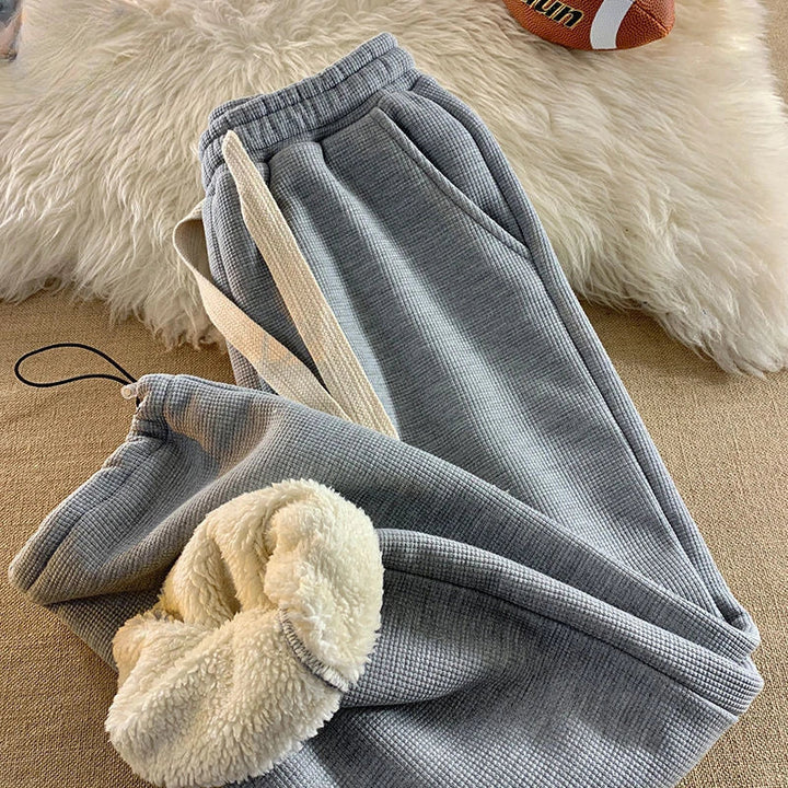 Warm women's plush winter lounge pants, designed for cozy comfort with a relaxed fit. Soft bottoms for home.