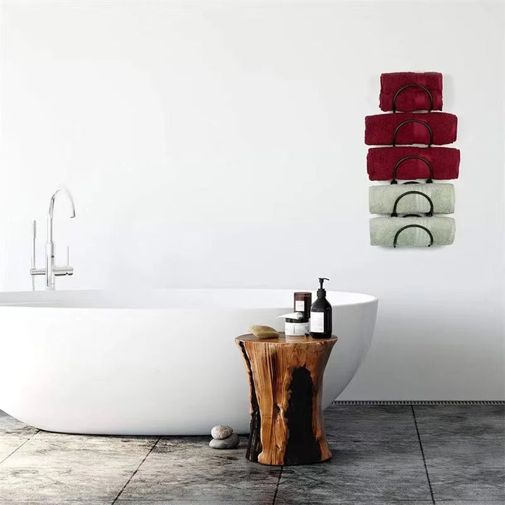 Declutter your bathroom with this rustproof multi-layer wrought iron towel rack organizer. Efficient wall mount storage.