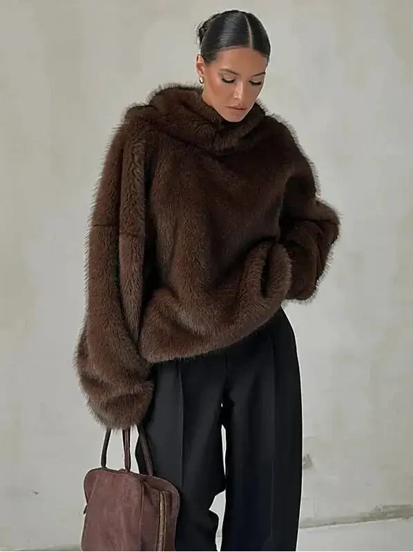 Women's ultra-soft oversized hoodie pullover, perfect for winter warmth & cozy casual style. Plush loungewear.