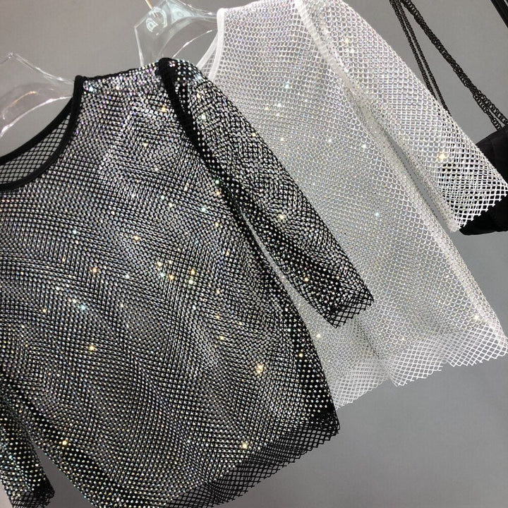 Comfortable one-size women's sparkle t-shirt, a stylish and shimmering party top for festive occasions.