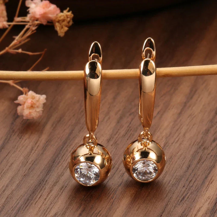 Luxurious rose gold zircon orb jewelry set for women, ideal elegant gift for anniversaries.