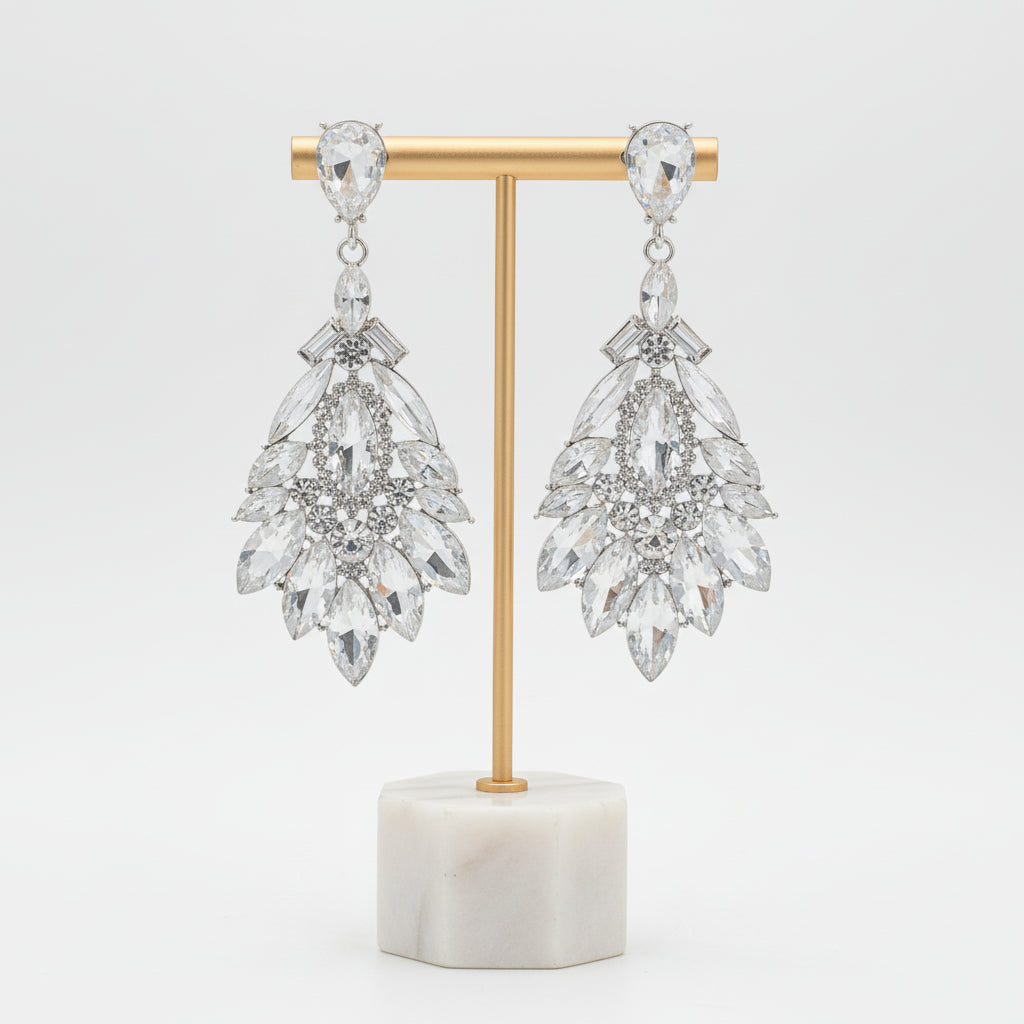Exquisite crystal drop earrings with sparkling rhinestones. Elegant women's jewelry, a glamorous fashion accessory.