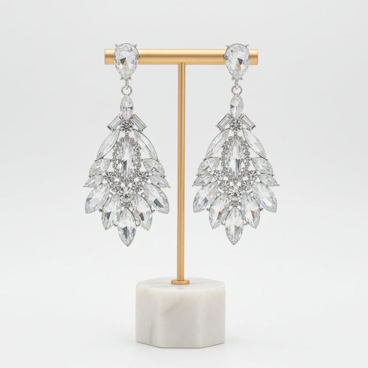 Exquisite crystal drop earrings with sparkling rhinestones. Elegant women's jewelry, a glamorous fashion accessory.