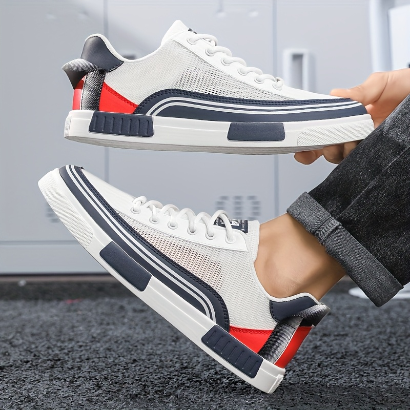 Stylish blue men's fashion sneakers, providing dynamic comfort for daily wear.