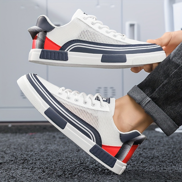 Stylish blue men's fashion sneakers, providing dynamic comfort for daily wear.