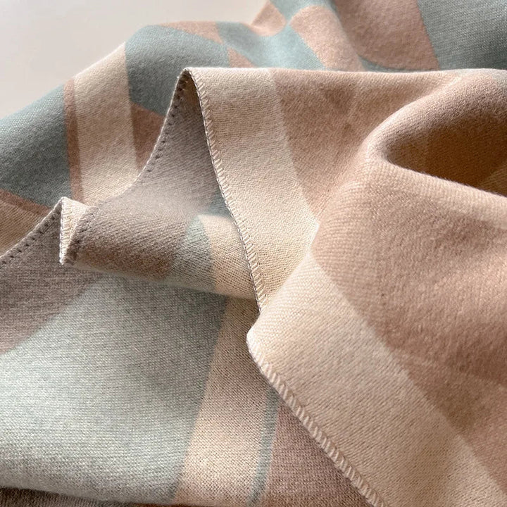 Fashionable women's cashmere blend winter wrap shawl, a warm and elegant one-size accessory.