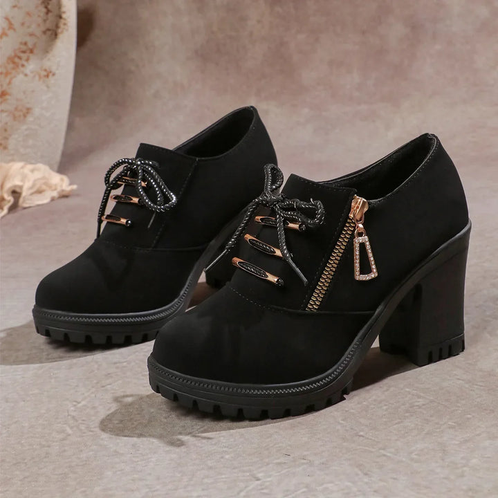 Elegant black lace-up block heels, a timeless choice for women seeking stylish & comfortable footwear.