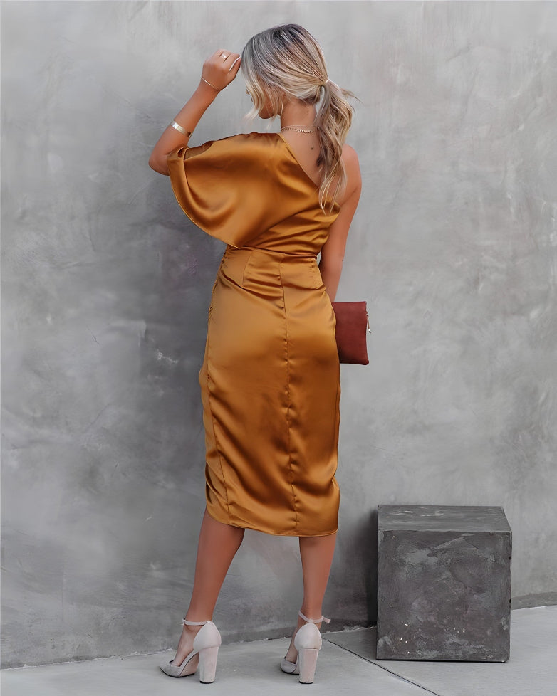 Luxurious asymmetrical off-shoulder maxi dress, ideal for elegant events.