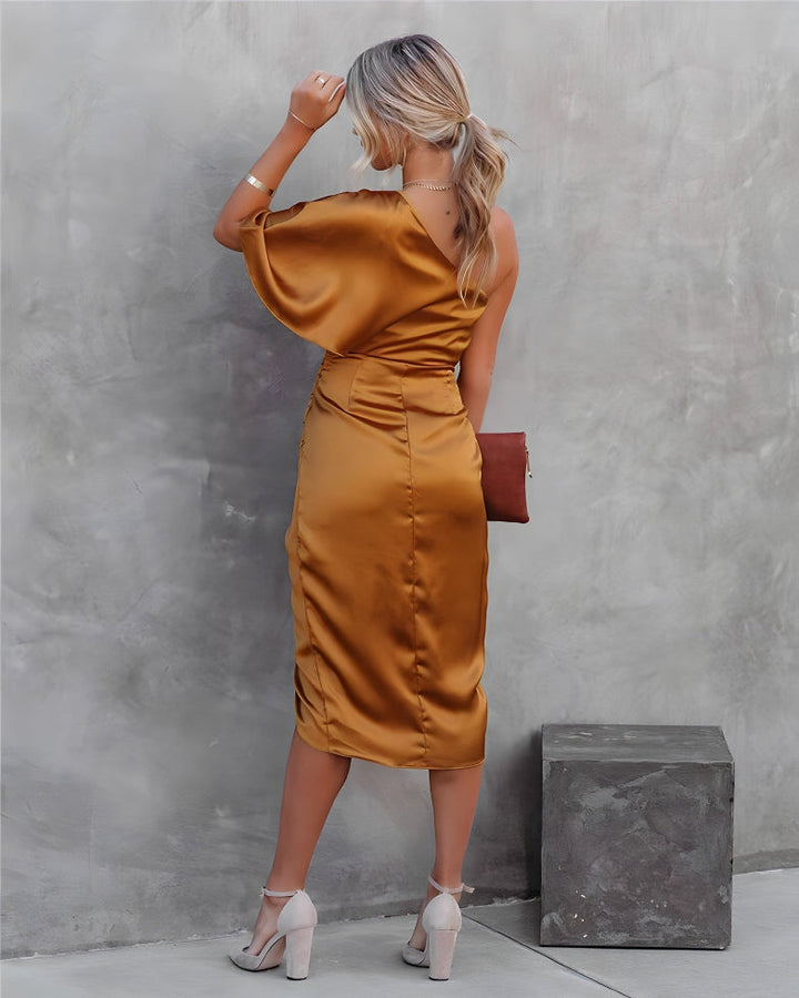 Luxurious asymmetrical off-shoulder maxi dress, ideal for elegant events.