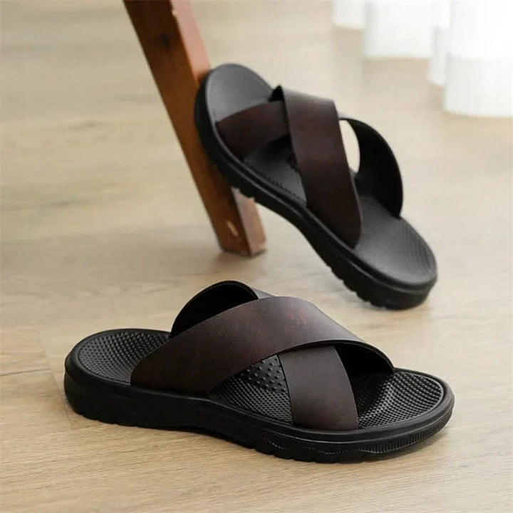 Durable men's comfort sandals with classic strappy design. Supportive everyday slip-on footwear.