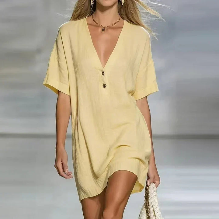 Women's chic V-neck summer shirt dress with relaxed fit. Perfect for casual wear & vacations.