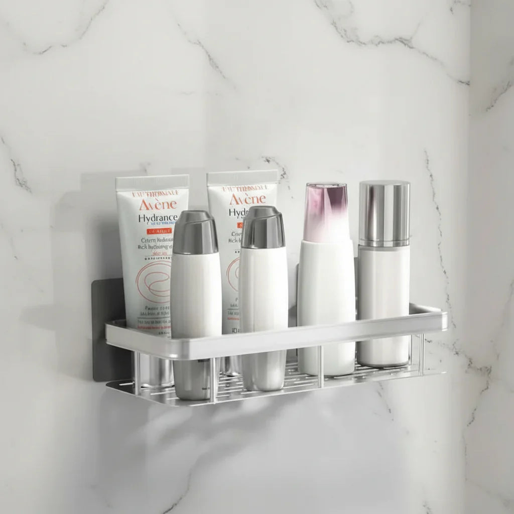 Drill-free adhesive wall organizer, modern stainless steel bathroom shelf for clutter-free storage.