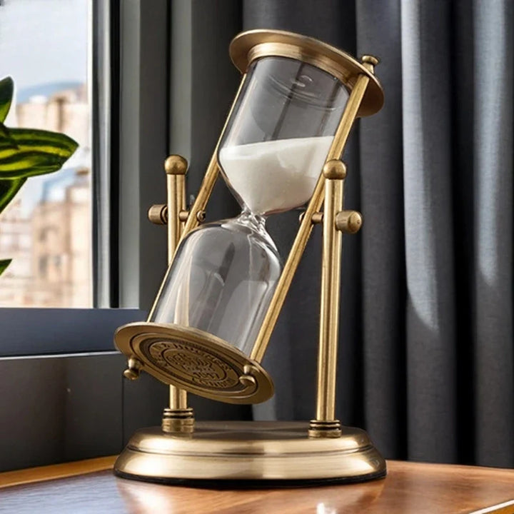 Elegant hourglass sand timer with sleek design for desk decor, home office, or meditation.